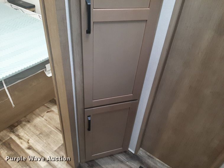 image for item DQ7055 2022 Keystone Raptor toy hauler camper