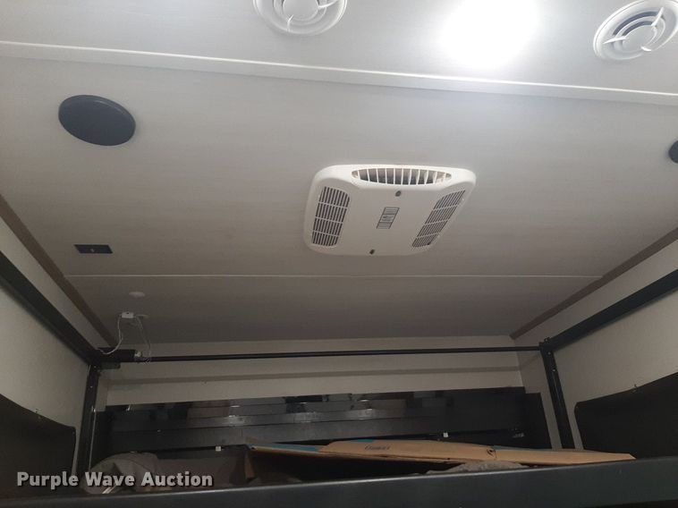 image for item DQ7055 2022 Keystone Raptor toy hauler camper