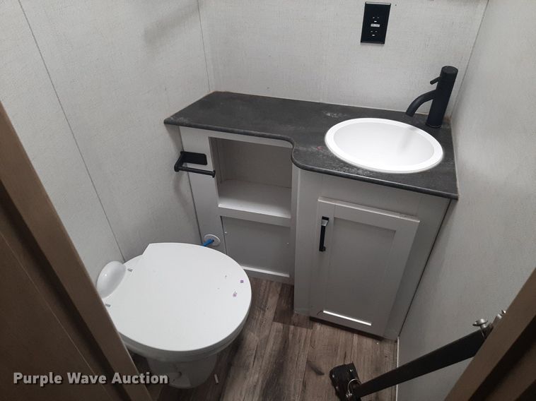 image for item DQ7055 2022 Keystone Raptor toy hauler camper