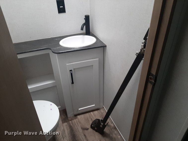 image for item DQ7055 2022 Keystone Raptor toy hauler camper