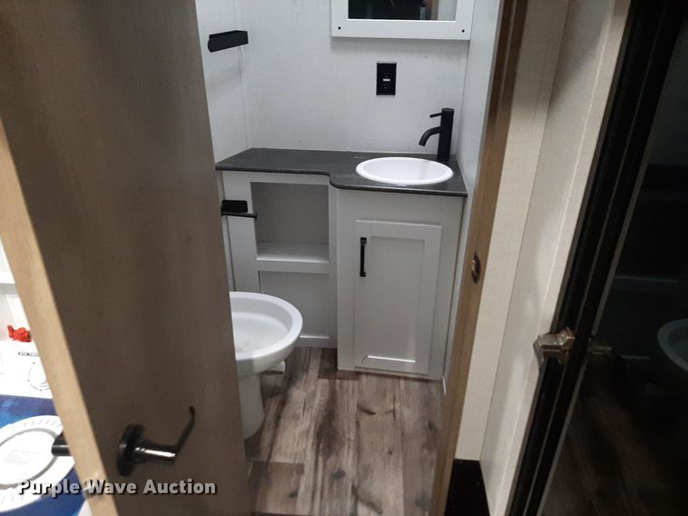 image for item DQ7055 2022 Keystone Raptor toy hauler camper