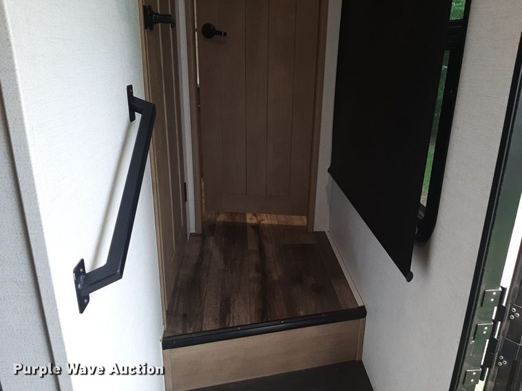 image for item DQ7055 2022 Keystone Raptor toy hauler camper