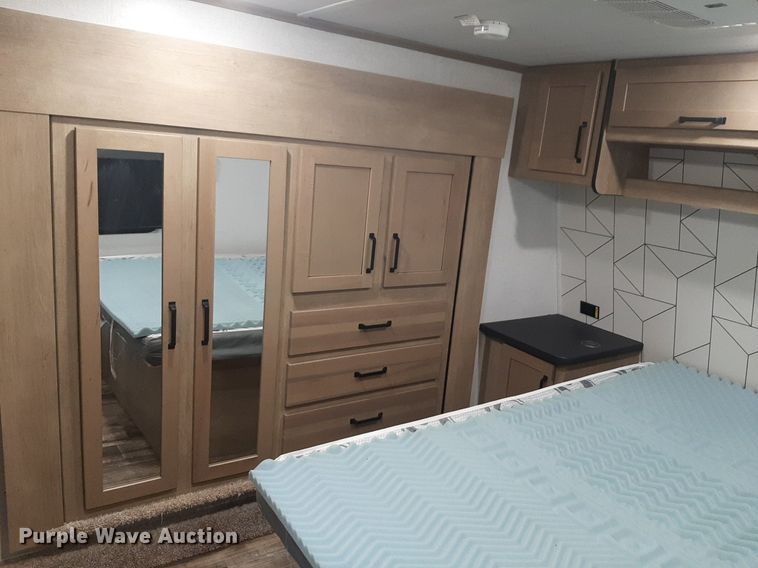 image for item DQ7055 2022 Keystone Raptor toy hauler camper