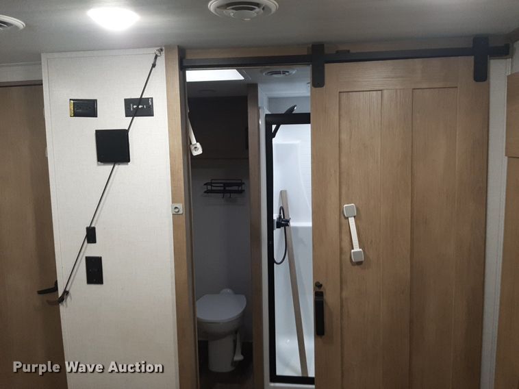 image for item DQ7055 2022 Keystone Raptor toy hauler camper