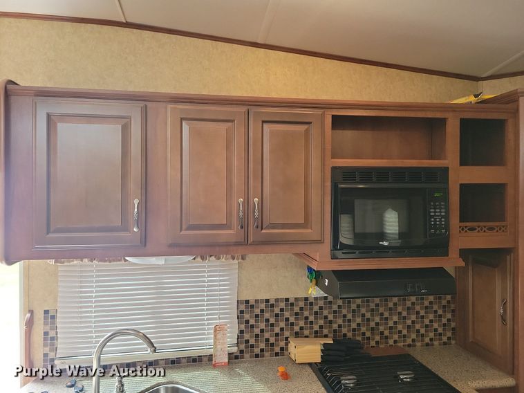 image for item DR4300 2012 Heartland Sundance 3300CK camper