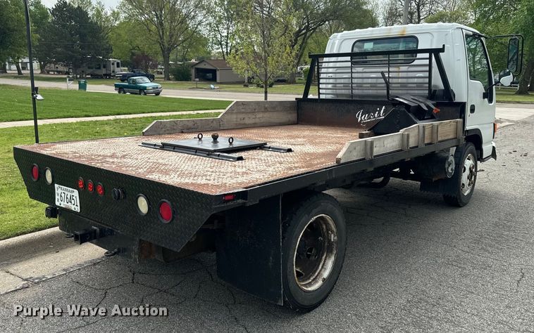 image for item EJ2694 1998 Isuzu NPR flatbed truck