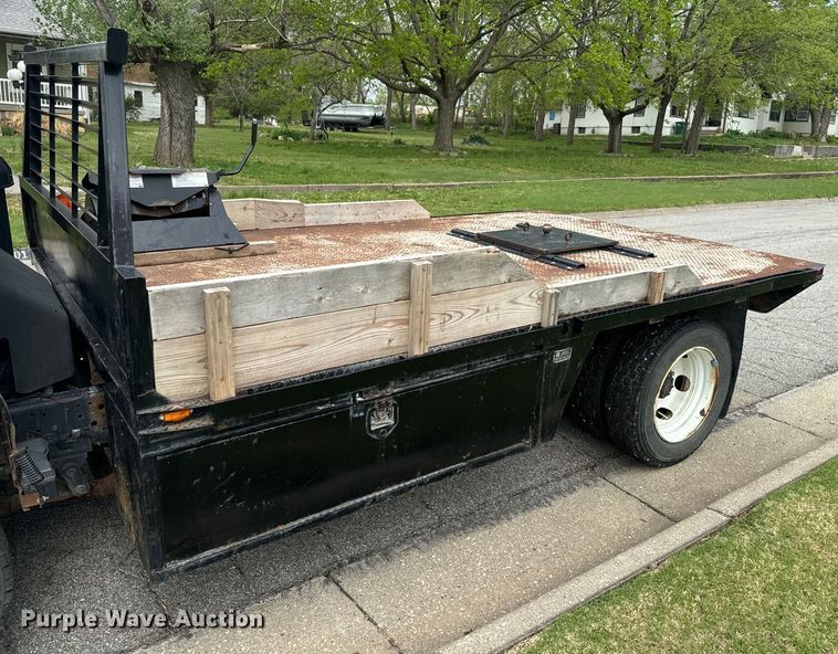 image for item EJ2694 1998 Isuzu NPR flatbed truck