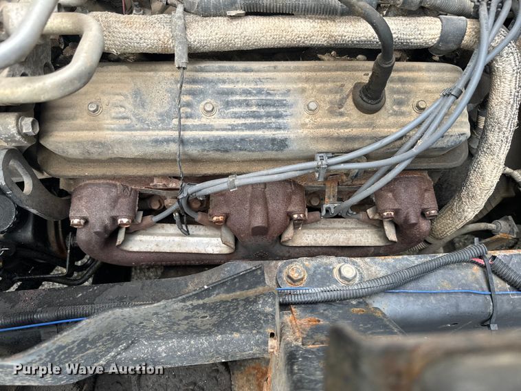 image for item EJ2694 1998 Isuzu NPR flatbed truck