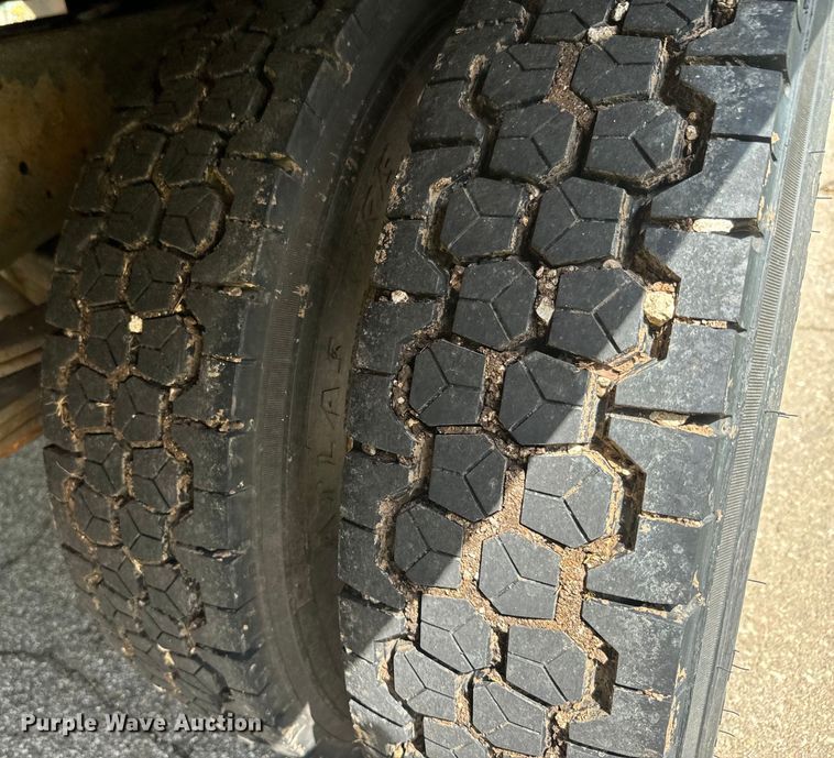 image for item EJ2694 1998 Isuzu NPR flatbed truck