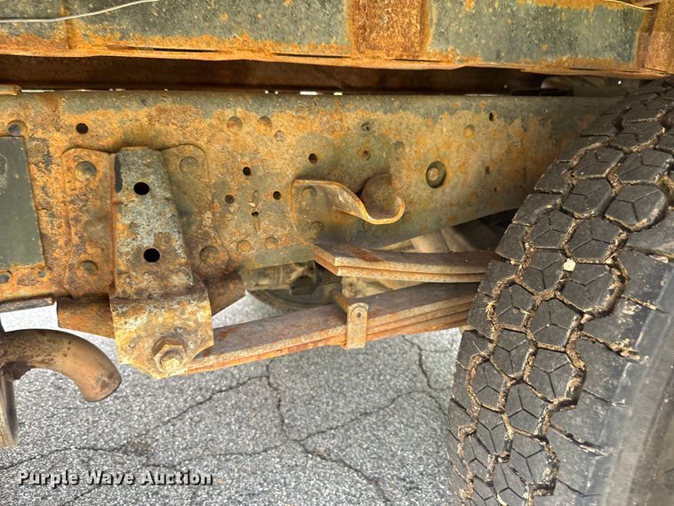 image for item EJ2694 1998 Isuzu NPR flatbed truck