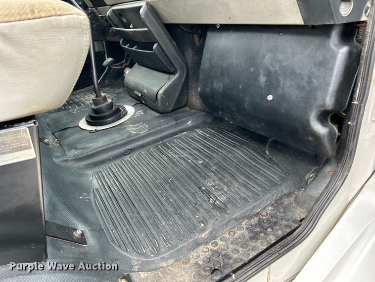 image for item EK4573 2001 Freightliner FL60 rollback truck