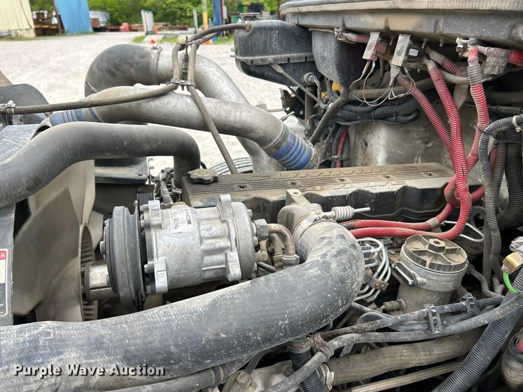 image for item EK4573 2001 Freightliner FL60 rollback truck