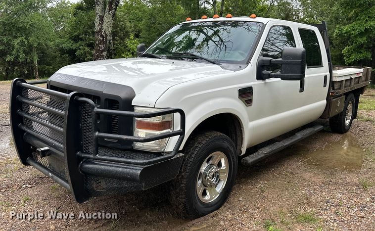 image for item NR9876 2008 Ford F350 Super Duty XL Crew Cab flatbed pickup truck