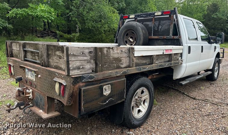 image for item NR9876 2008 Ford F350 Super Duty XL Crew Cab flatbed pickup truck