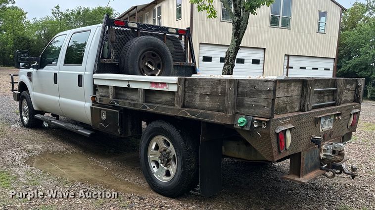 image for item NR9876 2008 Ford F350 Super Duty XL Crew Cab flatbed pickup truck