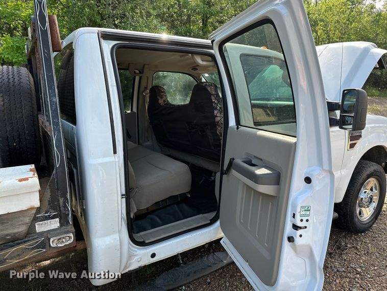 image for item NR9876 2008 Ford F350 Super Duty XL Crew Cab flatbed pickup truck