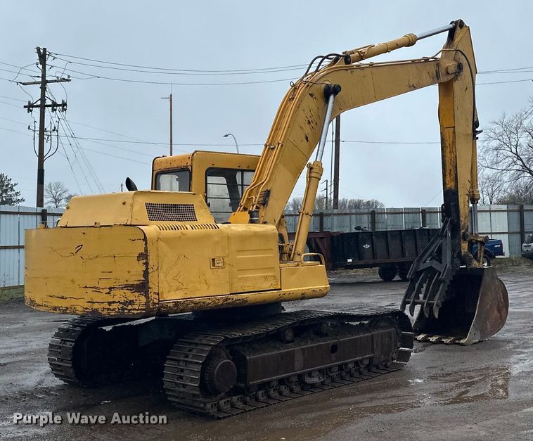 image for item DQ0802 1991 John Deere 590D excavator