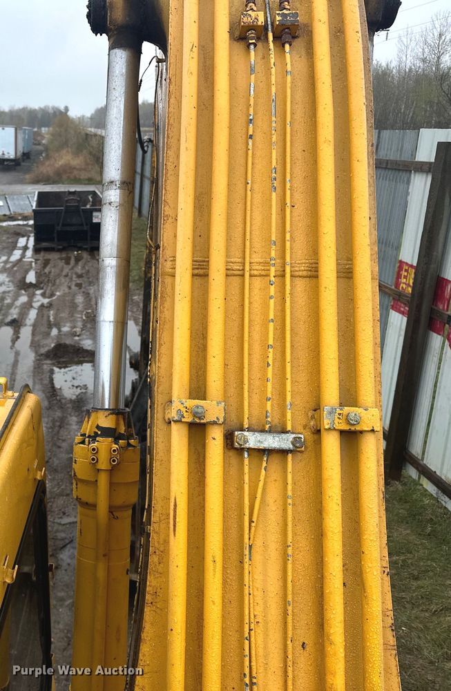 image for item DQ0802 1991 John Deere 590D excavator