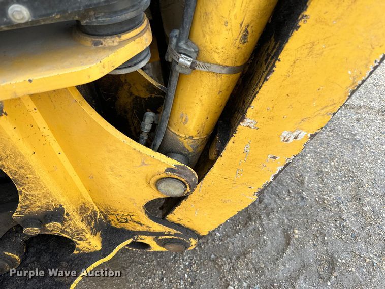 image for item DQ0824 2015 John Deere 310SL backhoe