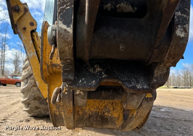 image for item DQ0824 2015 John Deere 310SL backhoe