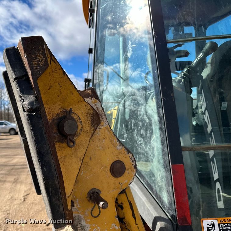 image for item DQ0824 2015 John Deere 310SL backhoe