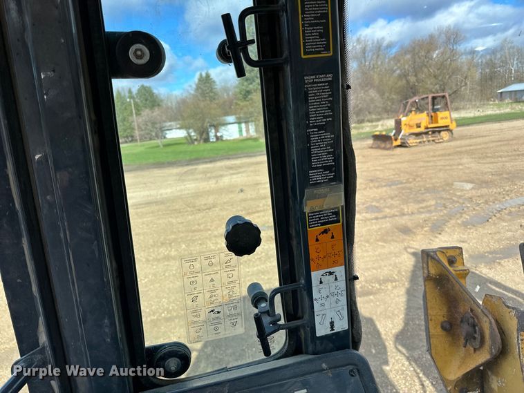 image for item DQ0824 2015 John Deere 310SL backhoe