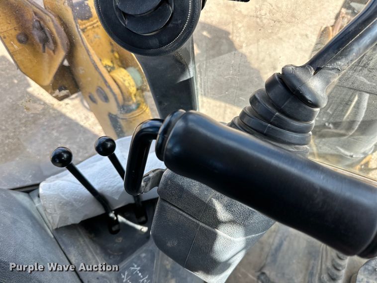 image for item DQ0824 2015 John Deere 310SL backhoe