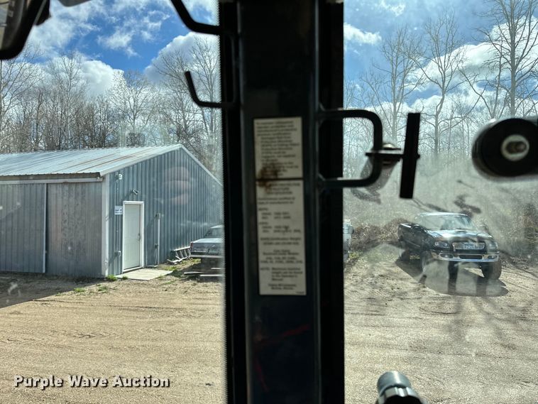 image for item DQ0824 2015 John Deere 310SL backhoe