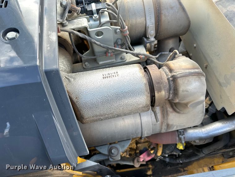 image for item DQ0824 2015 John Deere 310SL backhoe