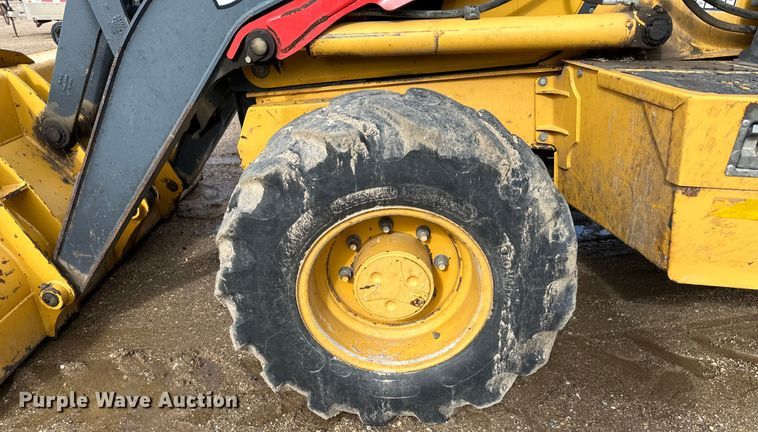 image for item DQ0824 2015 John Deere 310SL backhoe