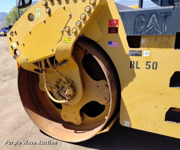 image for item DQ6088 2011 Caterpillar CB-54 double drum vibratory roller