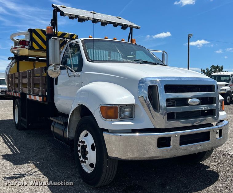 image for item EG1570 2007 Ford F650 Super Duty flatbed truck with crash attenuator