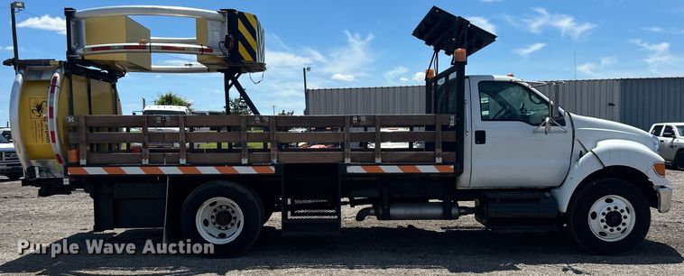 image for item EG1570 2007 Ford F650 Super Duty flatbed truck with crash attenuator