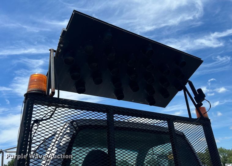 image for item EG1570 2007 Ford F650 Super Duty flatbed truck with crash attenuator