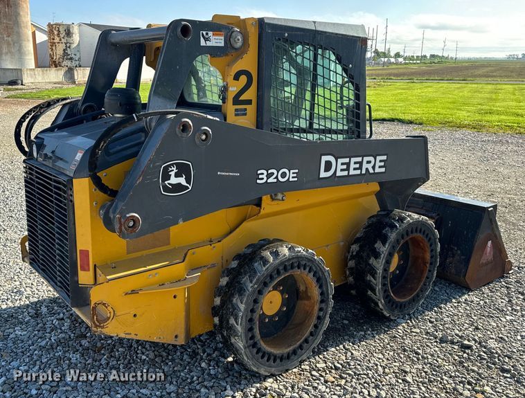 image for item EH6760 2015 John Deere 320E skid steer loader