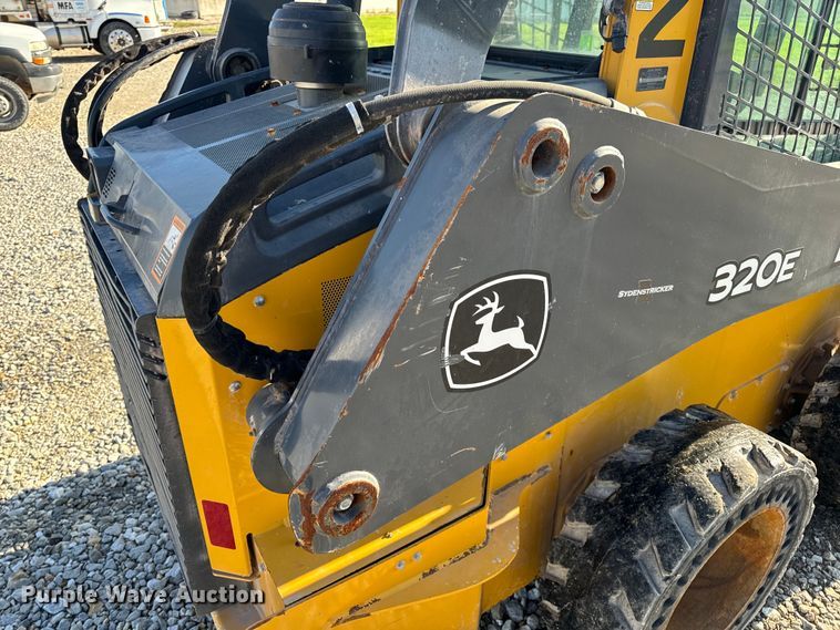 image for item EH6760 2015 John Deere 320E skid steer loader
