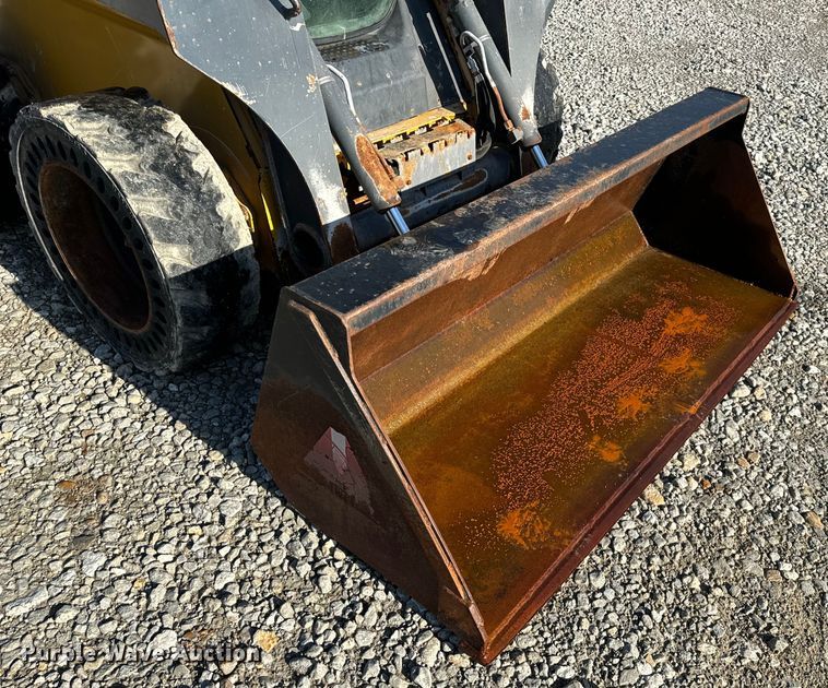 image for item EH6760 2015 John Deere 320E skid steer loader