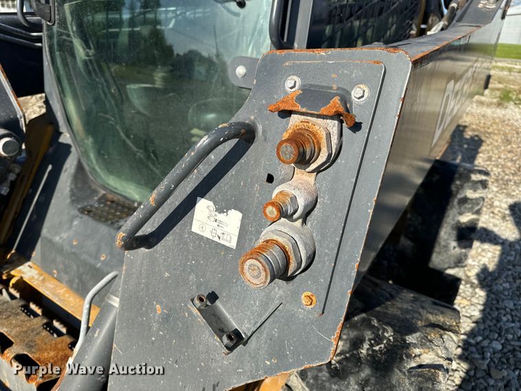 image for item EH6760 2015 John Deere 320E skid steer loader