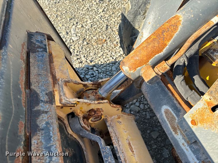 image for item EH6760 2015 John Deere 320E skid steer loader