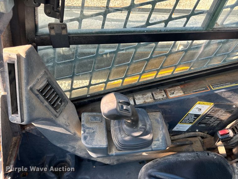 image for item EH6760 2015 John Deere 320E skid steer loader