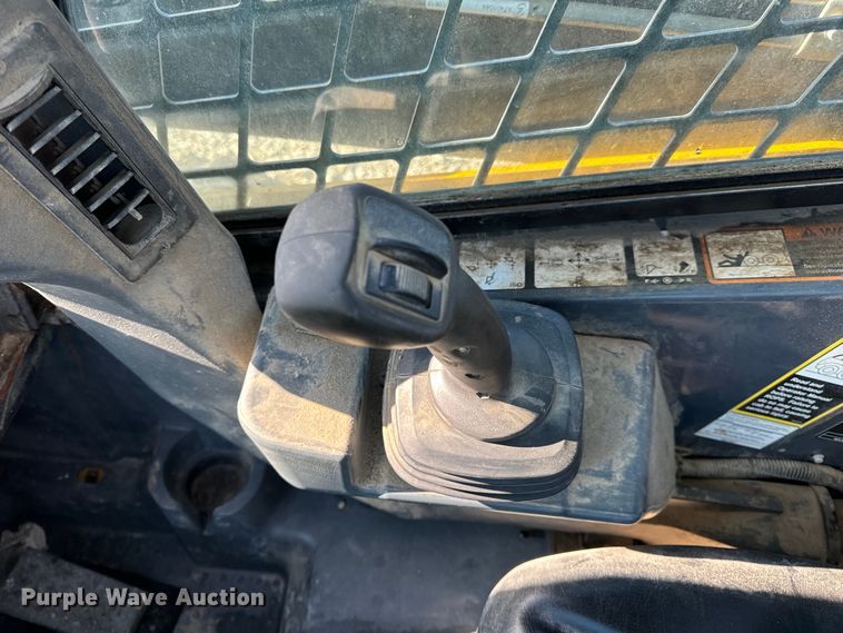 image for item EH6760 2015 John Deere 320E skid steer loader