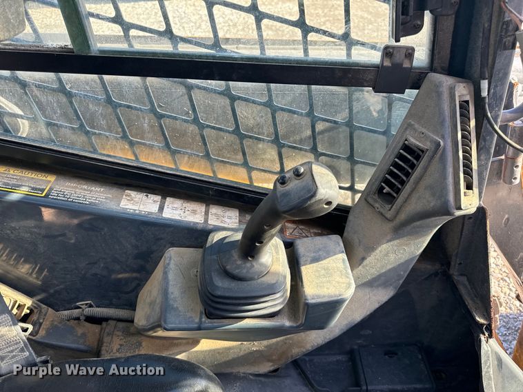 image for item EH6760 2015 John Deere 320E skid steer loader