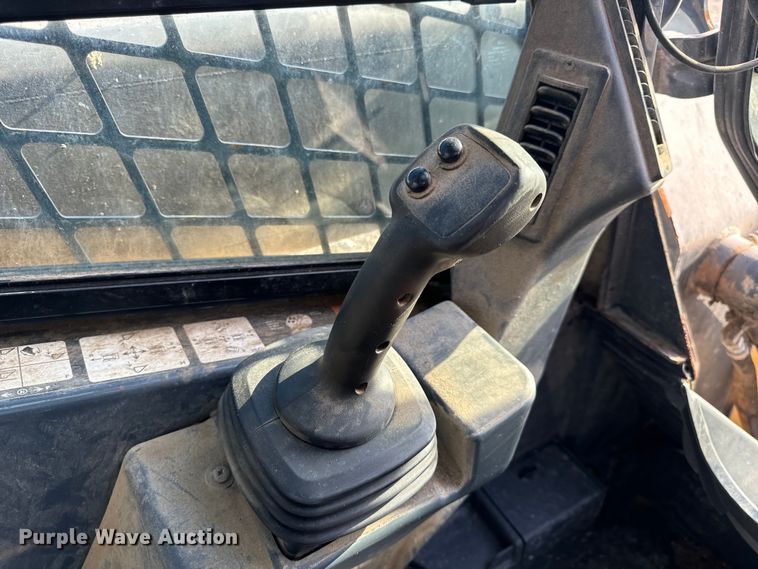 image for item EH6760 2015 John Deere 320E skid steer loader