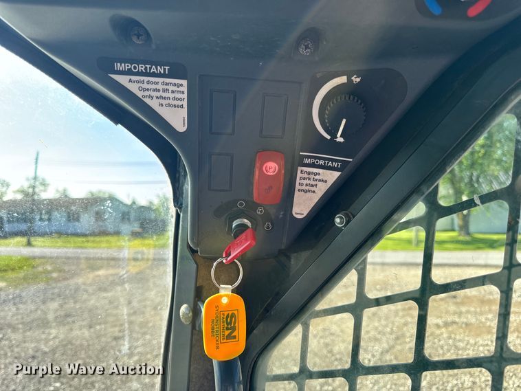 image for item EH6760 2015 John Deere 320E skid steer loader