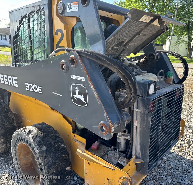 image for item EH6760 2015 John Deere 320E skid steer loader