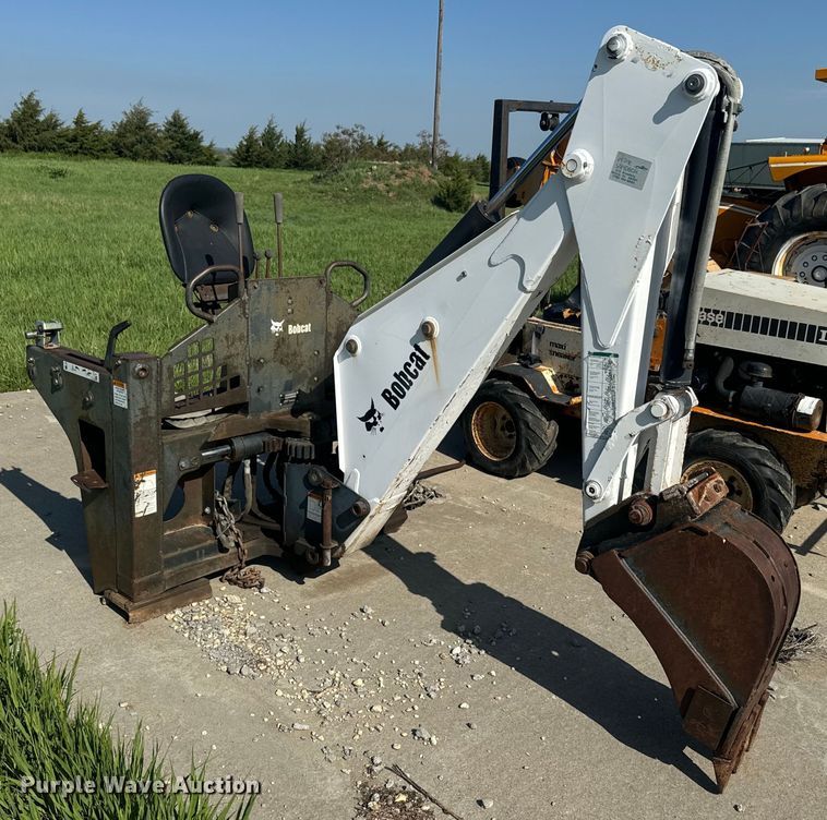 image for item EJ2704 Bobcat 709 Backhoe skid steer backhoe