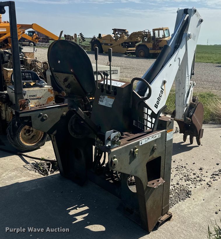 image for item EJ2704 Bobcat 709 Backhoe skid steer backhoe