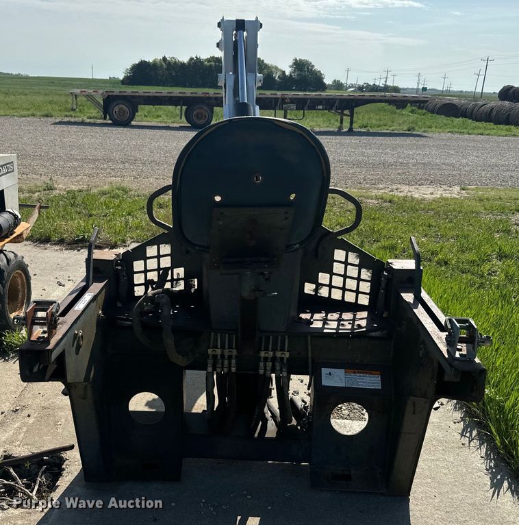 image for item EJ2704 Bobcat 709 Backhoe skid steer backhoe