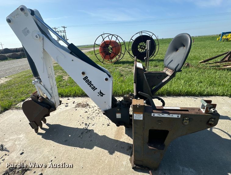 image for item EJ2704 Bobcat 709 Backhoe skid steer backhoe