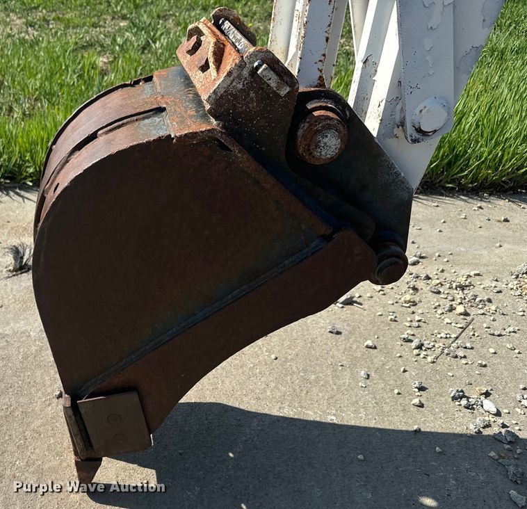 image for item EJ2704 Bobcat 709 Backhoe skid steer backhoe